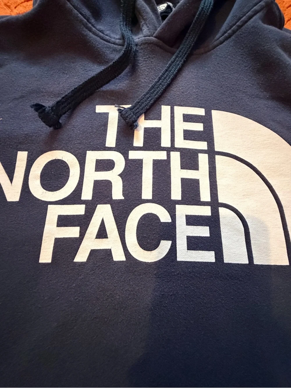The North Face Navy Pullover Hoodie with White Logo